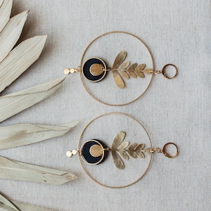 Acacia, Asymmetrical earrings made from recycled inner tube and brass