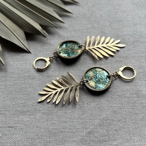 Brass leaf earrings, painted recycled inner tube.