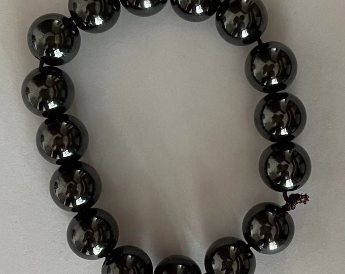 bracelet of black Titanium, 18 beads of 12mm diameter and 3.5mm hole