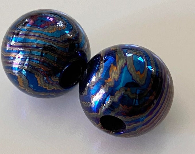 beads of TiDamascus (Mokume Ti), ZrTiDamascus (Mokume Zr&Ti) or black ZircTi 11mm diameter with a 3 mm hole