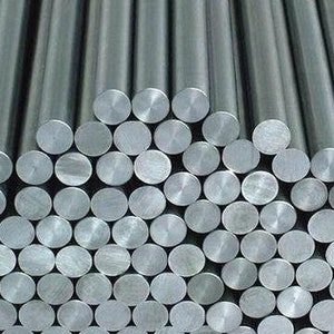 May include: A close-up of a stack of round, silver metal rods. The rods are smooth and shiny, and they are all the same size.