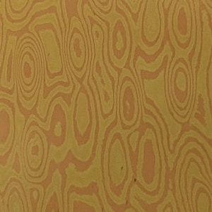 Puede incluir: Patrón abstracto con líneas en espiral en tonos amarillos y naranjas.