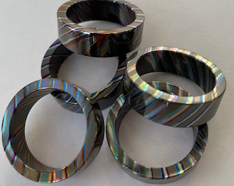 Four alloys Double Zr Mokume Ti (ZrTidamascus) ring blank, 7~12.5 size. Note: the ring blank was not polished and colored yet