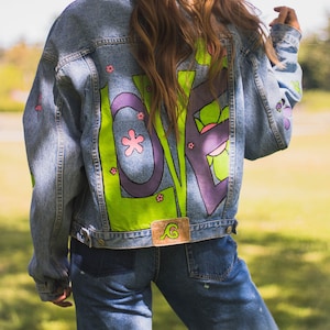psychedelic daisy denim jacket