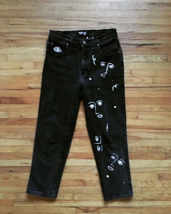 painting on black jeans