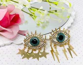 Boucle d’oreille Assymetrical Evil eye, boucles d’oreilles mauvais oeil or, boucles d’oreilles Eye clods, boucles d’oreilles cool, boucles d’oreilles esthétiques, boucles d’oreilles amusantes