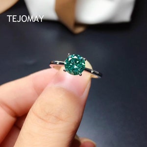 Elegant green gemstone style moissanite ring for women with timeless round cut sparkle