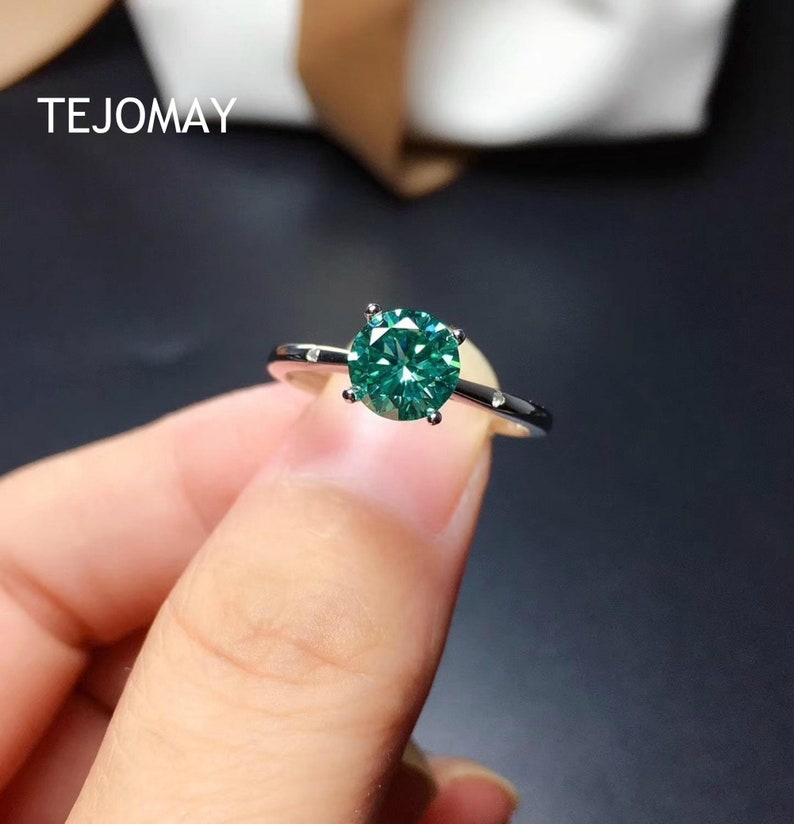 Elegant green gemstone style moissanite ring for women with timeless round cut sparkle