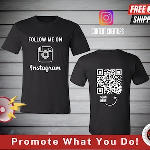 Puede incluir: Camiseta negra con texto blanco que dice "Sígueme en Instagram" y un icono de Instagram. La parte posterior de la camiseta tiene un código QR blanco con el texto "Escanea aquí" y una flecha que apunta al código.