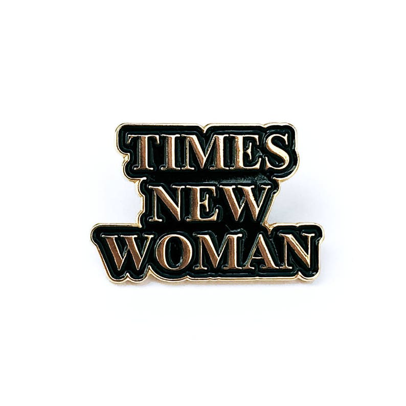 Times New Woman Gold Enamel Pin image 1