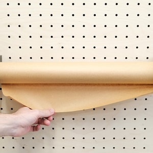 Paper roller kraft dispenser pegboard accessory