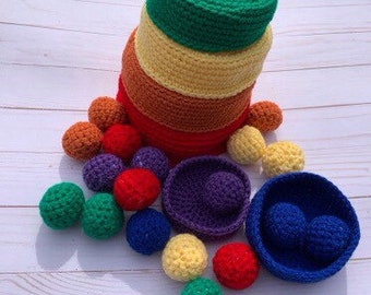 Rainbow stacking and sorting bowls and balls