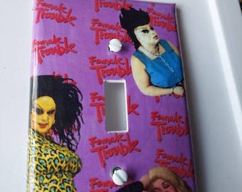 John Waters light switch cover. Female Trouble theme.