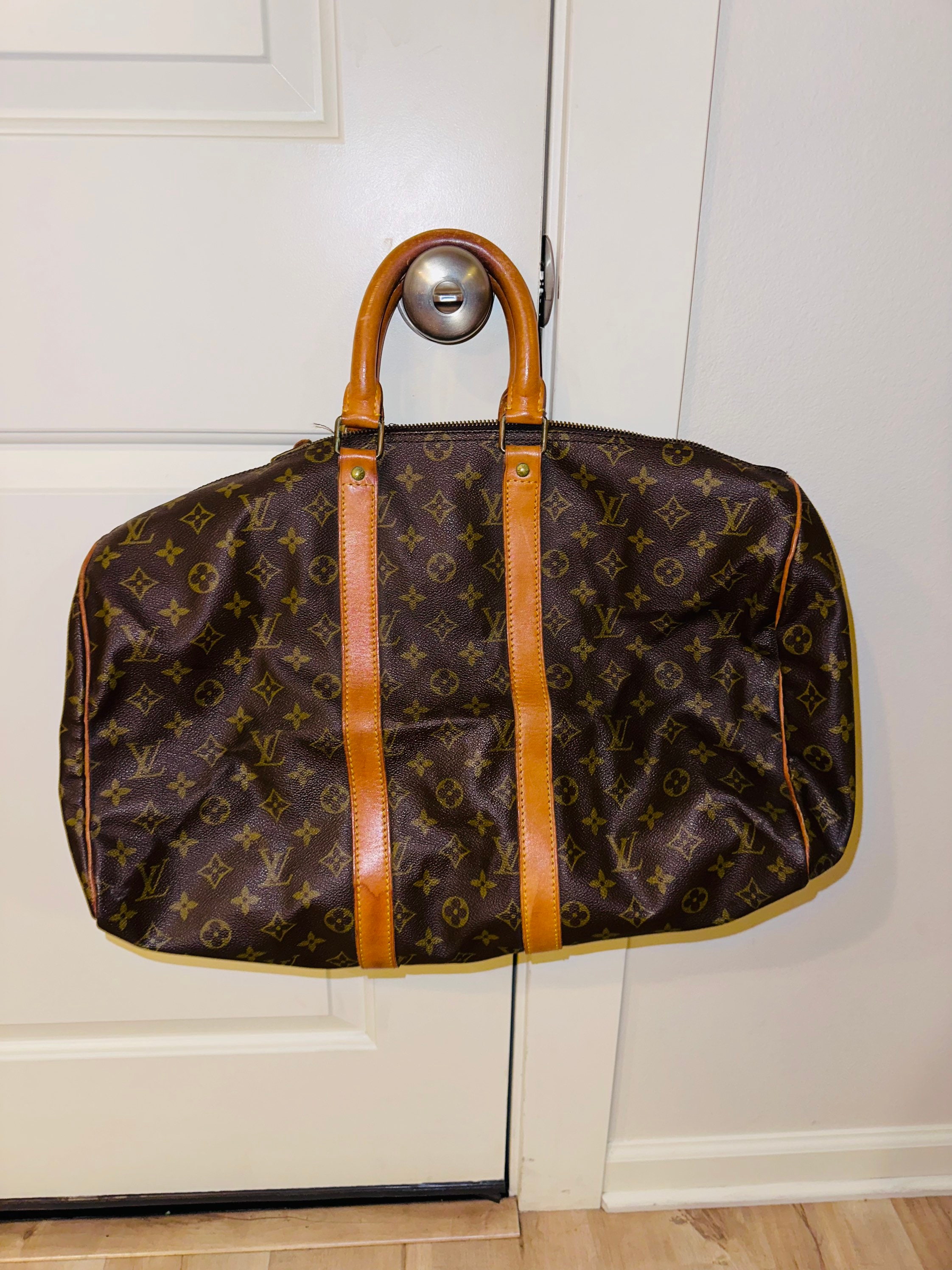 About how much would it cost to replace the handles, strap, and all the  vachetta leather on the outside of the keepall bandouliere 50? : r/ Louisvuitton