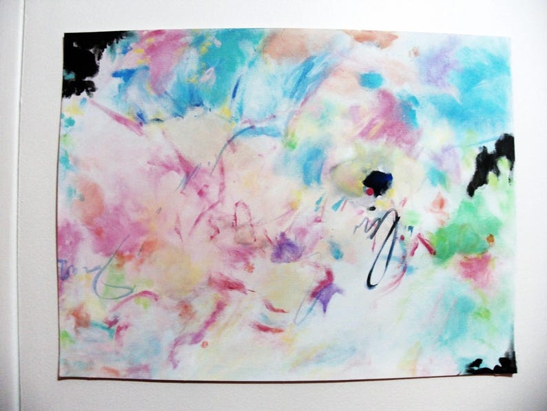 May include: Abstract watercolor painting with a vibrant mix of colors including pink, blue, green, and yellow. The artwork features loose brushstrokes and a dynamic composition, with black accents in the corners and a signature.