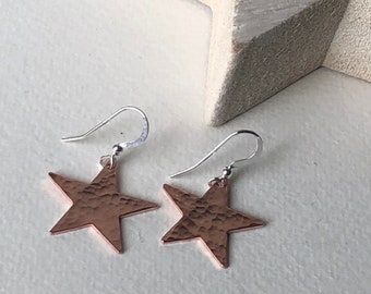 Copper star drop earrings