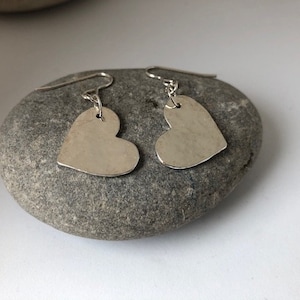 Silver heart hammered drop earrings image 1