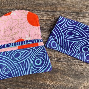 Mi cartera de bolsillo trasera, azul, naranja y rosa
