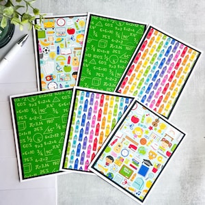 May include: Set of six greeting cards featuring a back-to-school theme. The cards feature a variety of colorful designs, including crayons, math equations, and school supplies. The cards are perfect for sending well wishes to students and teachers.