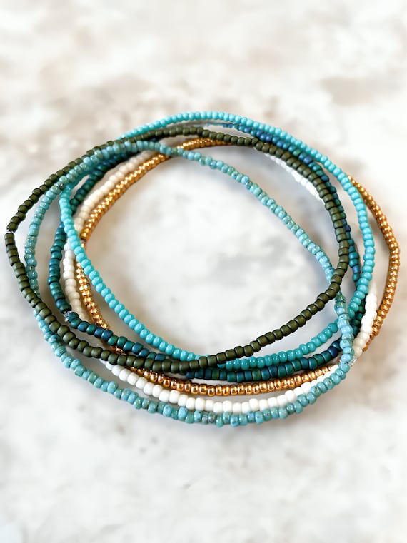 Friendship Stretch Bracelet Set of Six Green Teal White Gold Tone Beads Friendship Stretch Bracelet Set of Six Green Teal White Gold Tone Beads