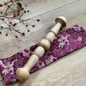 Tai Chi Ban model of a special shape made of European ash and a beautiful satin bag to go with it.