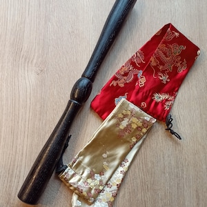A great gift option! A special shape model of Tai Chi Ban made of European ash  and a satin bag for it