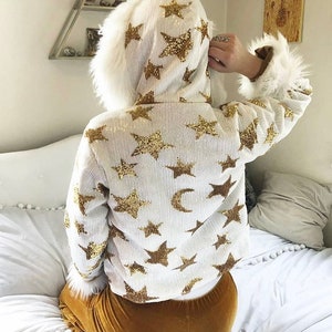 Cappotto in pelliccia sintetica celeste