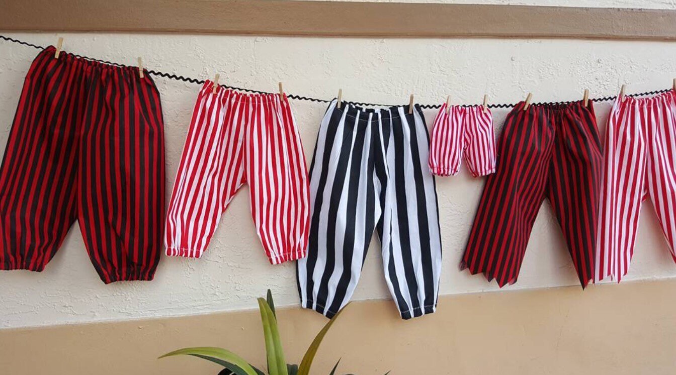 red black and white striped pants