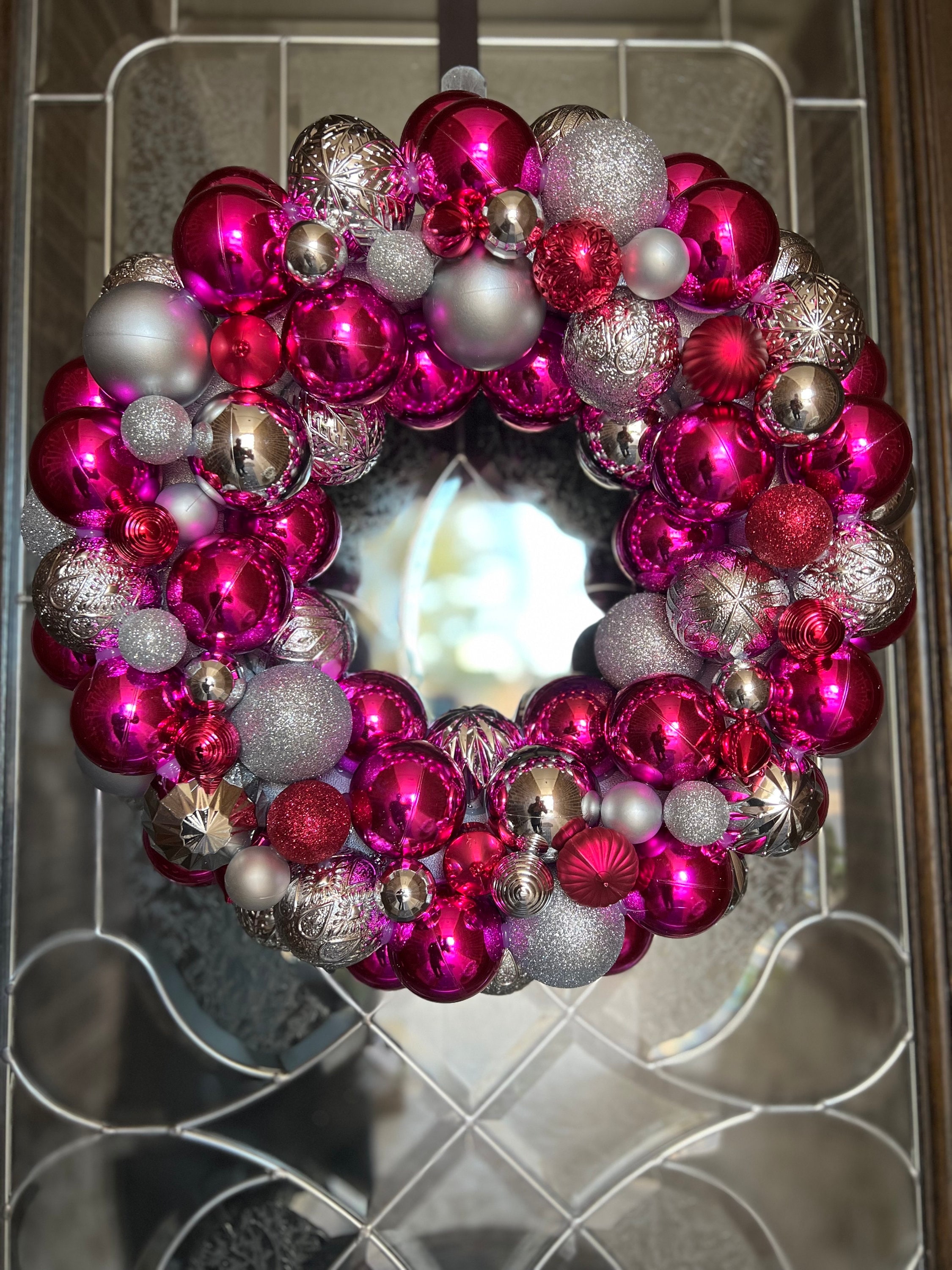 Wreath Of Small Red, Pink And Purple Christmas Tree Balls On