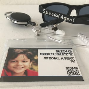 FREE SHIPPING Eligible! earbud earpiece badge and glasses