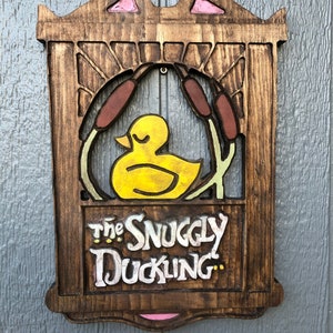 The Snuggly Duckling Tangled Repunzel sign