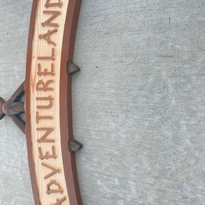 Adventureland sign walt disneyworld pirates of the caribbean swiss family treehouse enchanted tiki room image 9