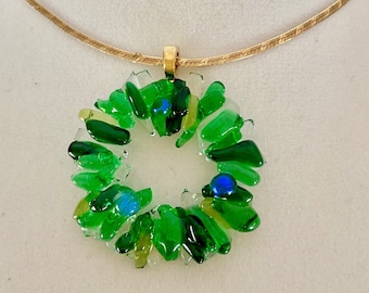 Christmas wreath pendant - fused glass - in different shades of green glass and iridized berries