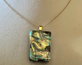 Gorgeous dichroic pendant in gold with hint of aqua blue and pink  iridescent colors - 3/4 inch X 1/2 inch