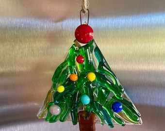 Fused Glass Christmas Tree ornament in different shades of green glass, some clear glass and with rainbow berries
