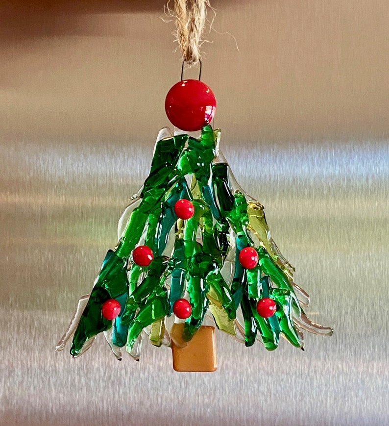 Fused glass tree ornament in different shades of green glass with some clear glass and red berries image 6