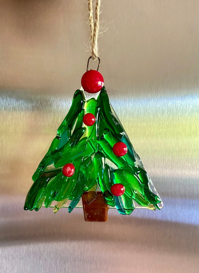 Fused glass tree ornament in different shades of green glass with some clear glass and red berries image 2