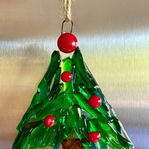 Fused glass tree ornament in different shades of green glass with some clear glass and red berries image 4