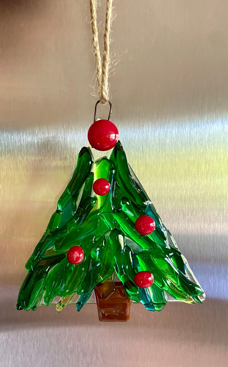 Fused glass tree ornament in different shades of green glass with some clear glass and red berries image 4