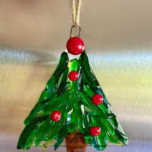 Fused glass tree ornament in different shades of green glass with some clear glass and red berries image 3