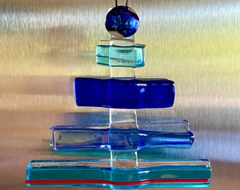 Fused Glass contemporary Christmas tree in different shades of blue with some red beach house ornament