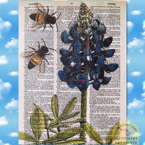 May include: A vintage dictionary page with a blue flower illustration and two bees. The page features the words "Aventine", "average", "aversion", "avoid", "awning", and "awe".