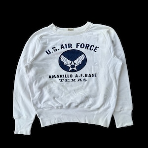 May include: White sweatshirt with a blue graphic of the U.S. Air Force logo and the text "U.S. AIR FORCE", "AMARILLO A.F. BASE", and "TEXAS".