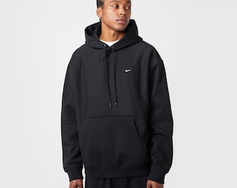 Vintage 90s Nike Solo Swoosh Men's Pullover Hoodie made from a heavyweight cotton-blend fleece.