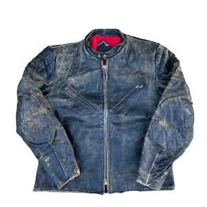 May include: A blue leather motorcycle jacket with quilted elbow patches and a red lining. The jacket is distressed and shows signs of wear.