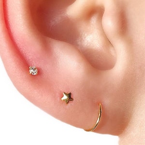 Pendientes minimalistas TINY Pendientes pequeños con forma de botón Pendientes con forma de estrella Pendientes con forma de botón Pendientes pequeños con forma de estrella Pendientes pequeños con forma de botón dorados Pendientes dorados Pendientes con forma de botón plateados