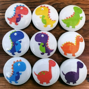 Dinosaur nursery wooden drawer knobs,40mm. Handmade Kids door knob with colourful dinosaur designs with screws. Dinosaur bedroom decor knobs