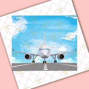 May include: A white aeroplane taxiing on a runway with a blue sky and white clouds in the background.