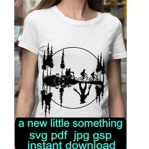 May include: A white t-shirt with a black silhouette design of a group of people riding bikes through a forest with a monster reflected in the water below. The text "a new little something svg pdf jpg gsp instant download" is at the bottom of the image.