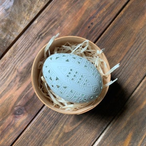 Ukrainian carved pysanka on araucana chicken egg: fish image 8